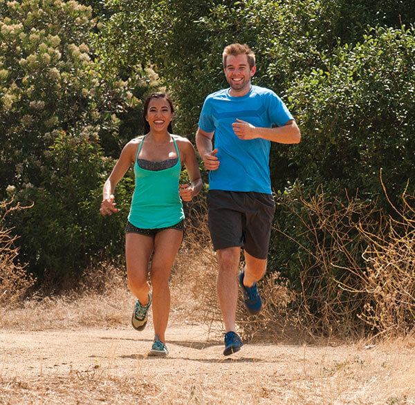 Couple Running wearing Xero Prios